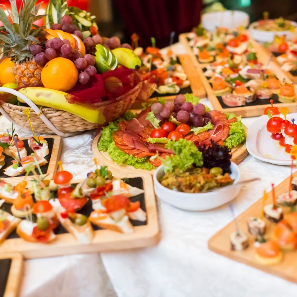 A table filled with food and appetizers.